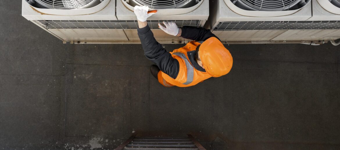 full-shot-man-working-with-equipment